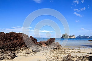 Red rock and blue sky,low tide