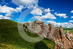 The red rock and blue sky white clouds summer