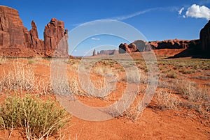 red rock formations inside Monument Valley