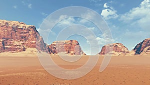 Red rocks among desert land panoramic view