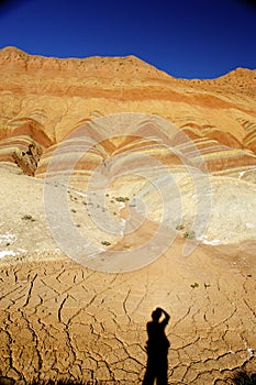 Red rocks and photographer's shadow