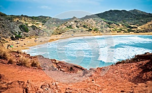 Red rocks on Playa de Cavalleria, Menorca