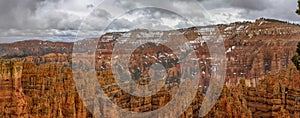 Red rocks under the cloudy sky in the Bryce Canyon National Park, Utah, the USA on a gloomy day