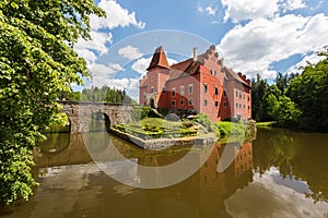 Red romantic castle Cervena Lhota photo