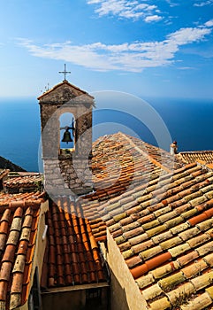 Red roof chapel cross with Mediterranean sea view at the French