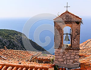 Red roof chapel cross with Mediterranean sea view at the French