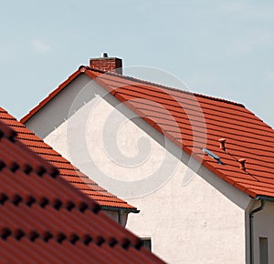 Red roof tiles on houses