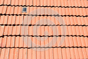 RED ROOF TOP TILES WITH SUNLIGHT GLASS