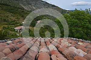 Red-roofed houses at the edge of canyon Verdon