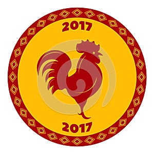 Red rooster in a round frame with an ornament in the rhomb