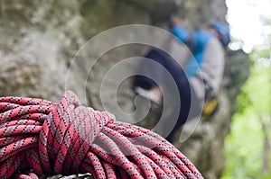 Red rope, blue climber