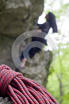 Red rope, blurred climber