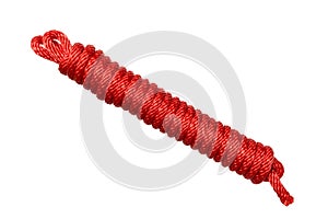 Red ropes twisted isolated on white background