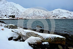 Red rorbu houses in Norway in winter