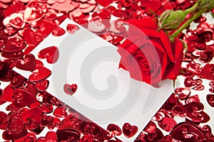 Red rose and blank invitation card