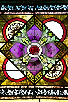 Red Rose Centered in Stained Glass Window photo