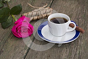 Red rose, cup of coffee and linking of cookies