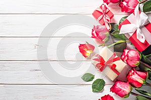 Red rose flower and present box on white table. photo