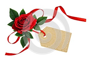 Red rose flower with silk ribbon bow and paper tag