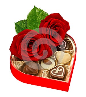 Red rose flowers chocolate pralines isolated white background
