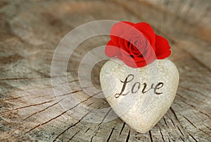 Red Rose and Heart On Wooden Background. Love and Valentines Day Concept.