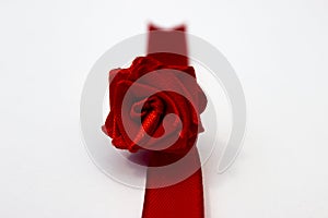 Red rose made by hand from satin ribbon