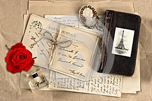 Red rose, old french letters and post cards