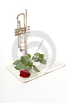 Red rose and old notes Sheet music trumpet
