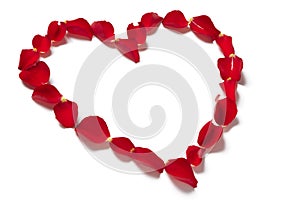 Red rose petals in heart shape