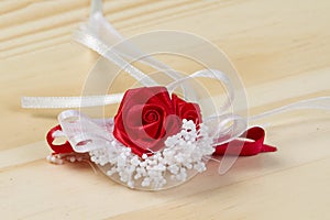 Red rose with white decoration