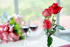Red rose and wine and Valentines day symbols