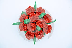 Red roses bouquet made with quiling technique