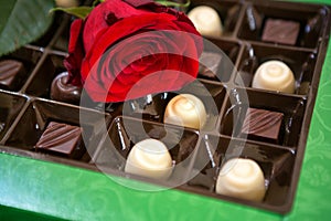 Red roses and chocolates background