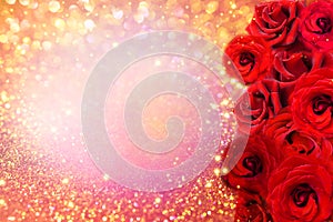 Red roses flower border on soft gold glitter background for valentine or invitation wedding card