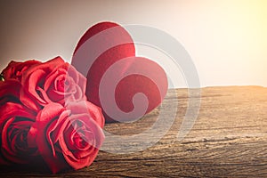 Red Roses with hearts on old wooden board, Valentines Day