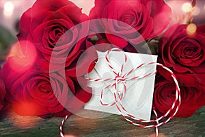 Red roses with love letter