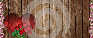 Red Roses and Pink flower borders on wooden background for Valentines day. Symbols of love for Happy Women`s, Mother`s, Valentin