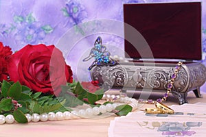 Red Roses with Wedding Bands and Jewelry Box