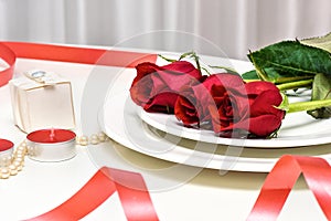 Red Roses on white background. Romantic composition for Valentine`s Day, Anniversary, Events. Place for text