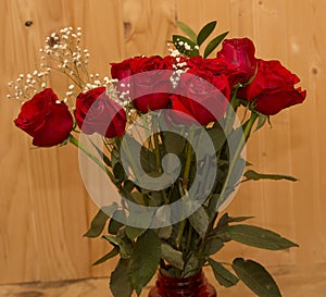 Red Roses with a wood backdrop