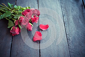 Red roses on wood background,Retro vintage ,