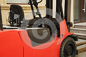 Red Rough Terrain Forklift in the yard