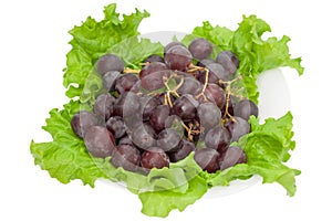 Red round grapes with salad whole view isolated on white background