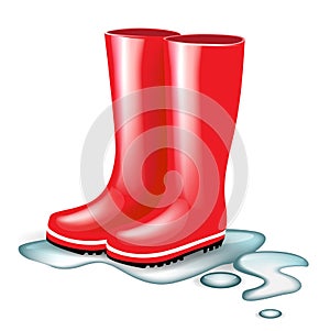 Red rubber boots in splash of water