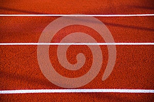 Red running sport track background and texture