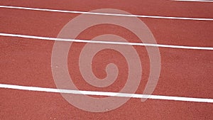 Red running sport track background and texture