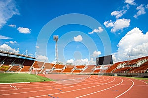 Red running track start point in athletic stadium from bangkok