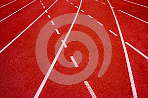 Red running track Synthetic rubber on the athletic stadium.