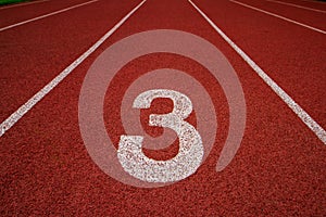 Red running track Synthetic rubber on the athletic stadium.