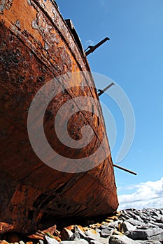 Red rust detail, old sank boat in Inisheer, Aran Islands photo
